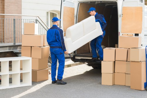 Professional movers handling fragile items with care in Tufnell Park