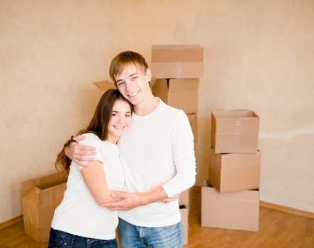 Moving boxes, tape, and wrapping materials prepared for transport