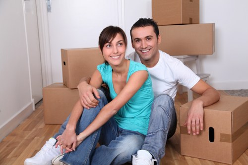 Packed moving boxes and furniture prepared for a home move