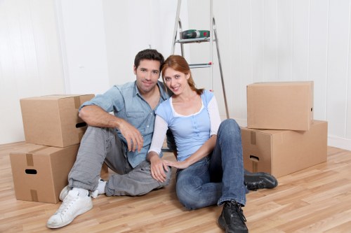 Donation-ready furniture and boxed items prepared for charity partnership collection
