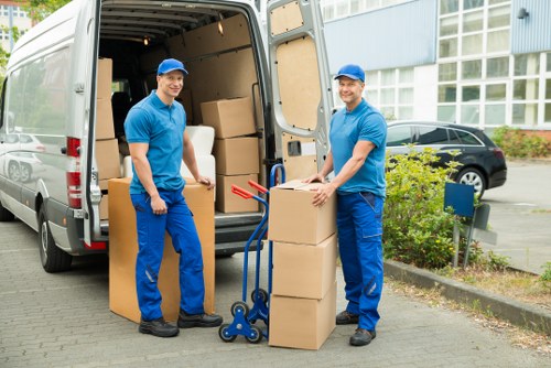 Supervisor overseeing safe loading practices for a removals job