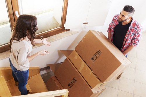 Packed boxes and furniture ready for local removals in North London
