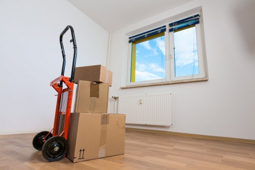 Commercial movers managing access and parking in a North London street