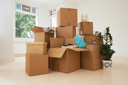 Same-day movers handling boxes and furniture in North London