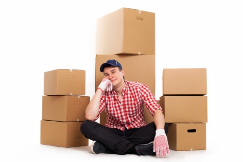 Careful loading of boxes and furniture for a house move in North London